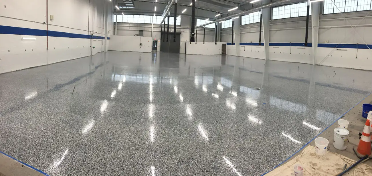 Epoxy flake floor coating installation